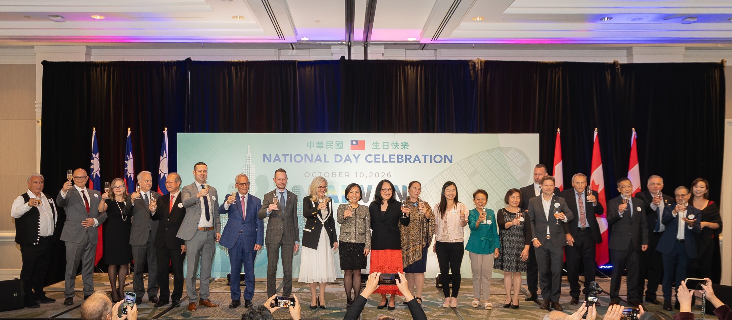 Dignitaries raise a toast to celebrate the 115th National Day